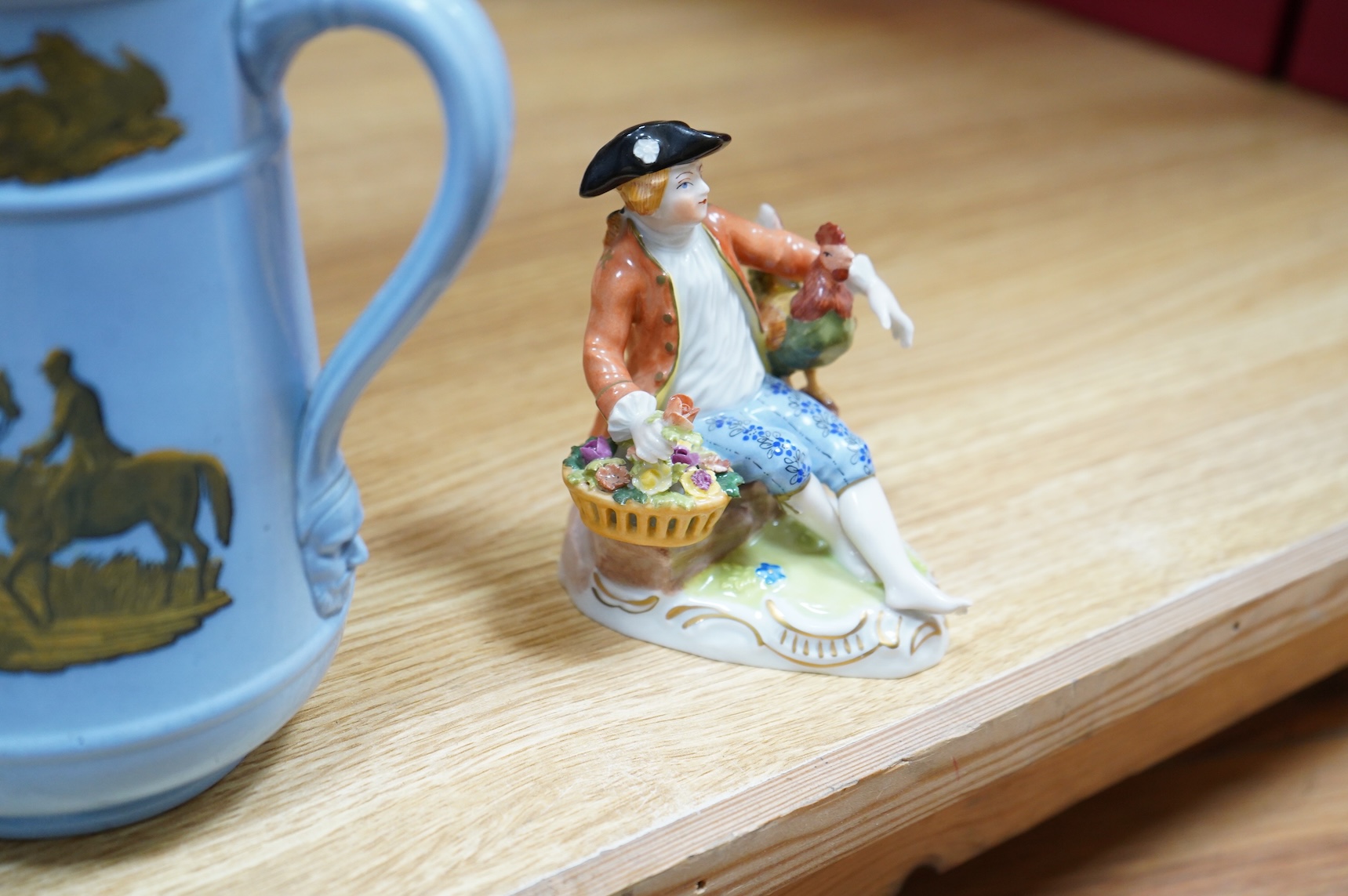 A collection of mixed ceramics including a Dresden figure and cabinet cups and saucers